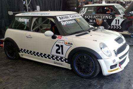 Chris' BMW Mini in the pits at Manfeild - March 2009. Martin Collins applies the livery.